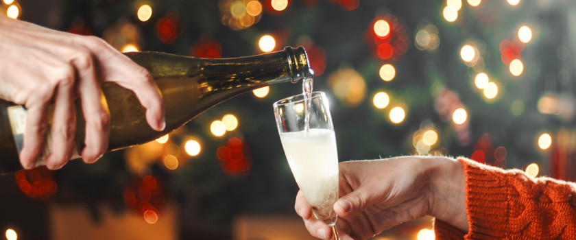 Pouring champagne on New Year's Eve