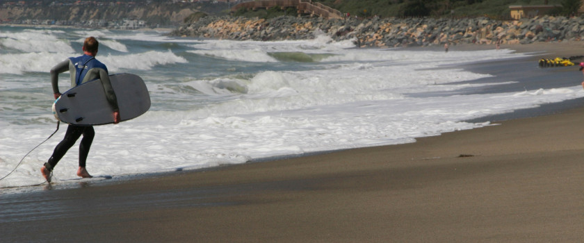 Surfer on a California beach.