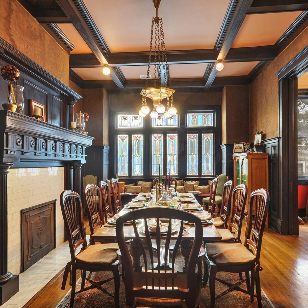 An elegant dining area with the table set at Canal Street Inn.